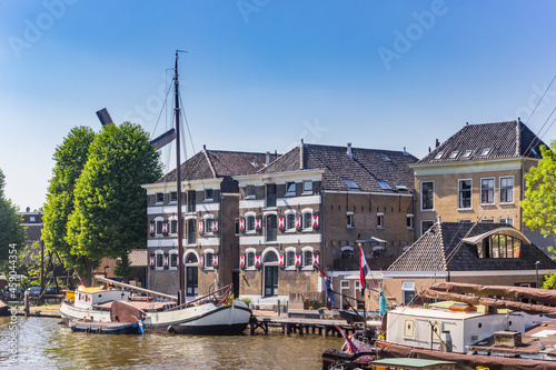 Old warehouses in the historic harbor of Gouda, The Netherlands photo