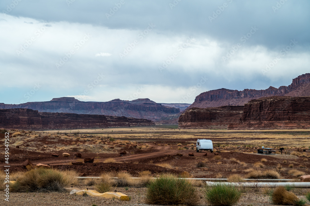 Hite Marina Campground with little white camper, Utah, USA. Copy space for text. 
