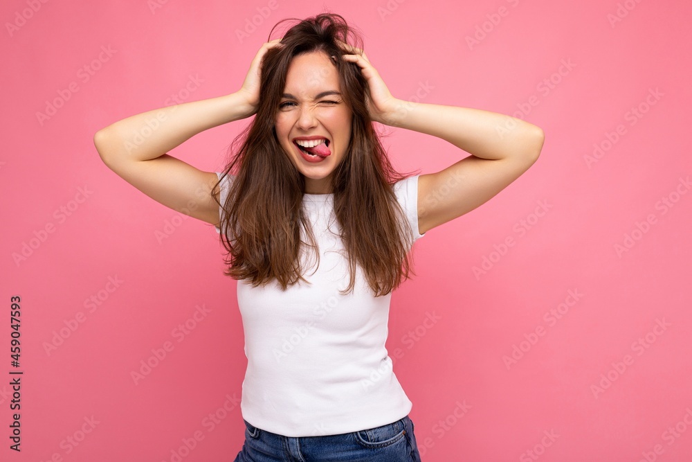 Photo shot of cute nice charming gorgeous attractive pretty youngster happy and joyful woman wearing white t-shirt for mockup isolated over colorful background with copy space Photo shot of cute nice charming gorgeous attractive pretty youngster happy and joyful woman wearing white t-shirt for mockup isolated over colorful background with copy space