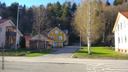 Fototapeta Naklejka Na Ścianę i Meble -  Yellow country house in  European village.
