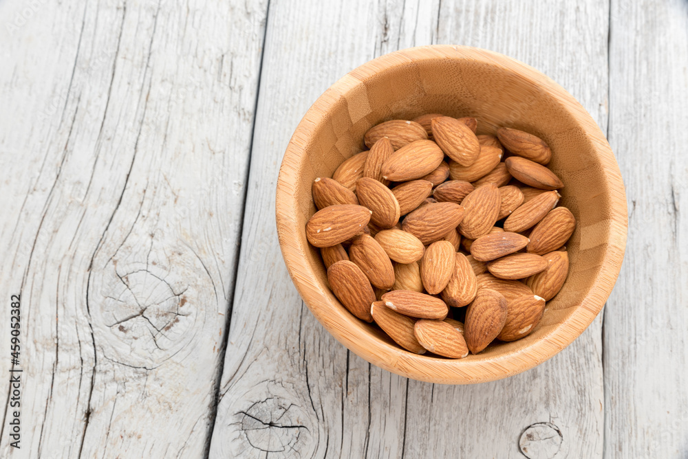 Almonds on the wooden table Almonds on the wooden table