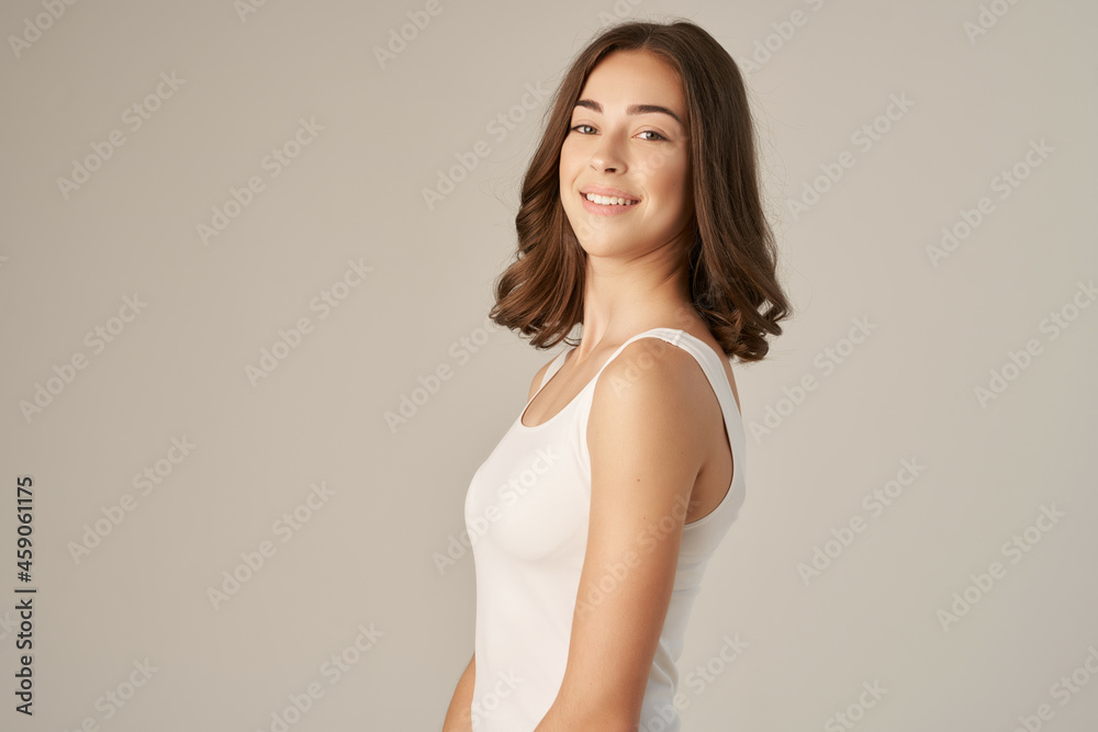 pretty woman smile emotions clear skin light background pretty woman smile emotions clear skin light background