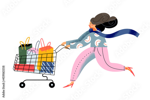 Girl running with shopping cart to shop at supermarket, store or boutique on black friday