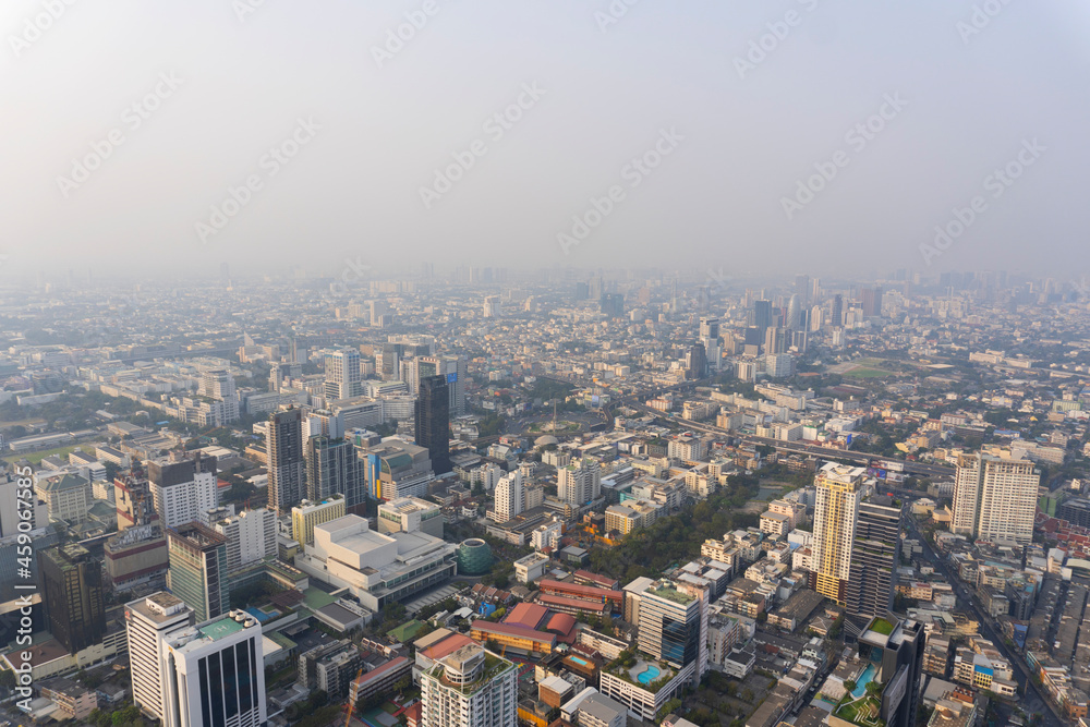 Landscape of the wide top view Bangkok metropolis Thailand with the dirty clouds air pollution problem. the tower and building in business area