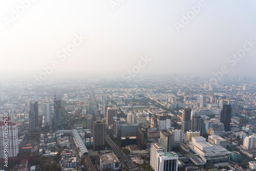 Landscape of the top view Bangkok metropolis Thailand with the dirty clouds air pollution problem. the tower and building in business area