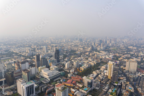 Landscape of the wide top view Bangkok metropolis Thailand with the dirty clouds air pollution problem. the tower and building in business area