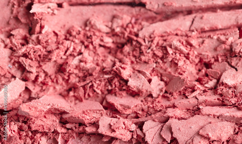Cosmetic texture background. Broken eye shadows. Pink magenta decorative cosmetics Cosmetic texture background. Broken eye shadows. Pink magenta decorative cosmetics