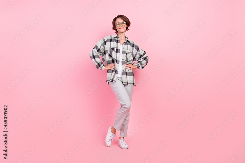 Full body photo of young attractive woman happy positive smile confident isolated over pink color background Full body photo of young attractive woman happy positive smile confident isolated over pink color background