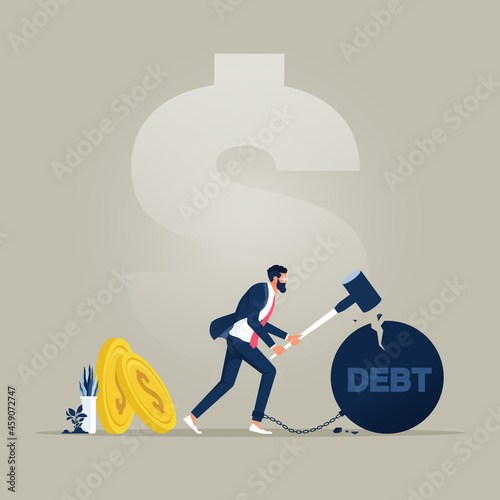Businessman trying to destroy iron ball with debt word that chained his feet with hammer, symbolizing struggle for freedom from crisis