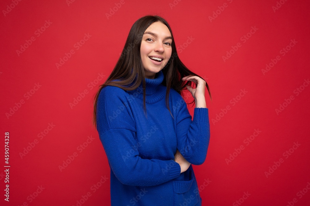 Fototapeta premium Photo of beautiful positive smiling adult woman wearing stylish clothes standing isolated on colorful background with copy space looking at camera