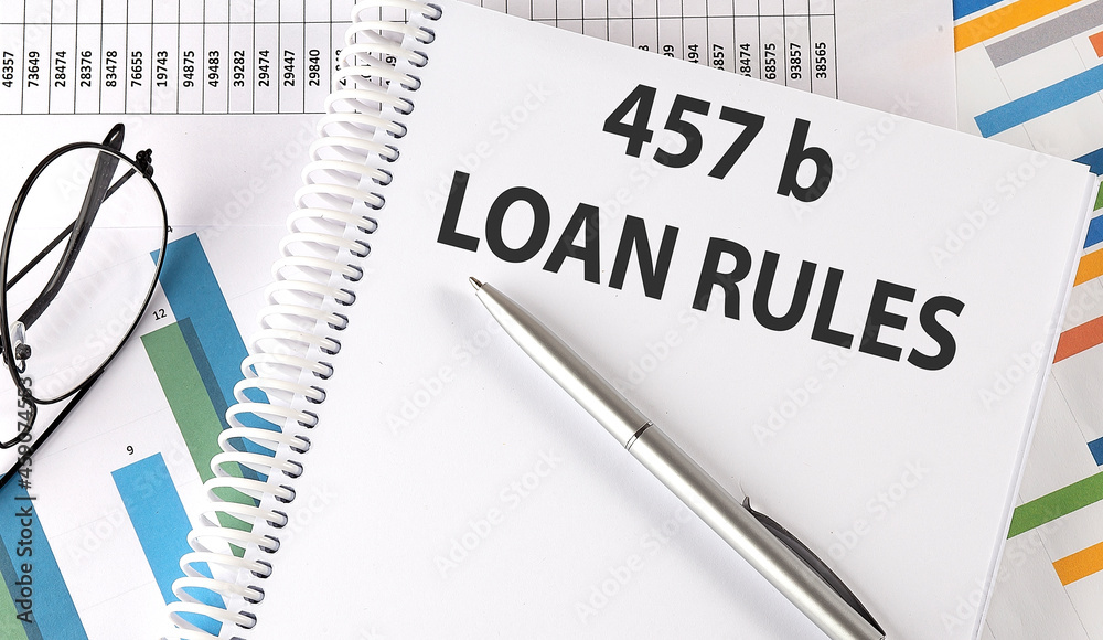 457B LOAN RULES , pen and glasses on the chart, business concept 457B LOAN RULES , pen and glasses on the chart, business concept