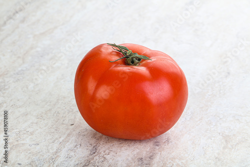 Red ripe big tomato isolated