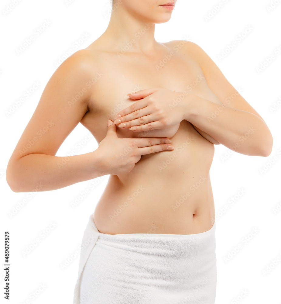 Fototapeta premium Woman examining breast isolated on white background