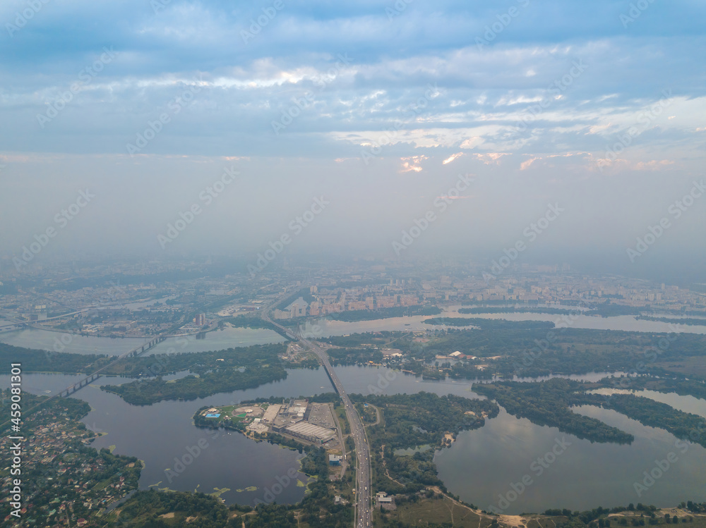 Sunset over Kiev. Cloudy evening. Aerial drone view.