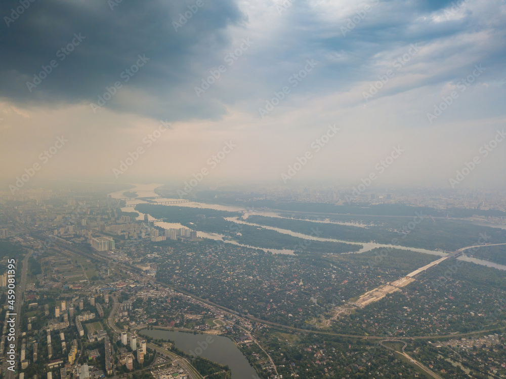 Sunset over Kiev. Cloudy evening. Aerial drone view.