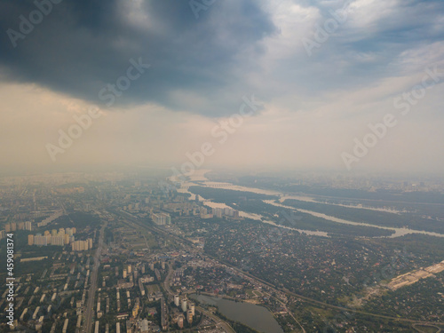 Sunset over Kiev. Cloudy evening. Aerial drone view.