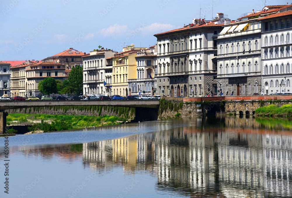 First building from right - St. Regis Florence - 5 star hotel, facades along Arno river in historic part of Florence, in front Amerigo Vespuci bridge, Florence, Italy, Europe