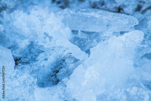 melting ice on blue background