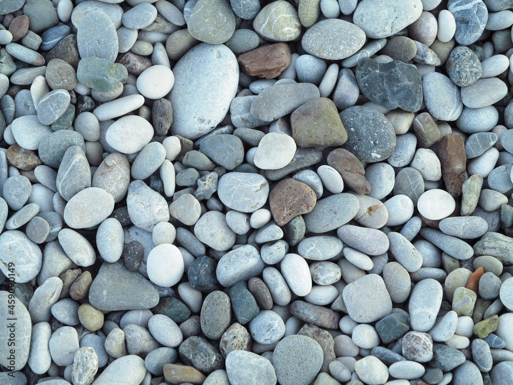 Sea colorful and gray small stones pebbles on a beach Sea colorful and gray small stones pebbles on a beach