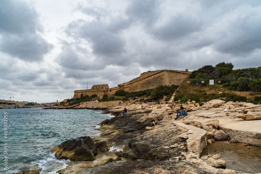 Fort Manoel viewed from the beach at Manoel Island located in Marsamxett Harbour, Gzira Malta.