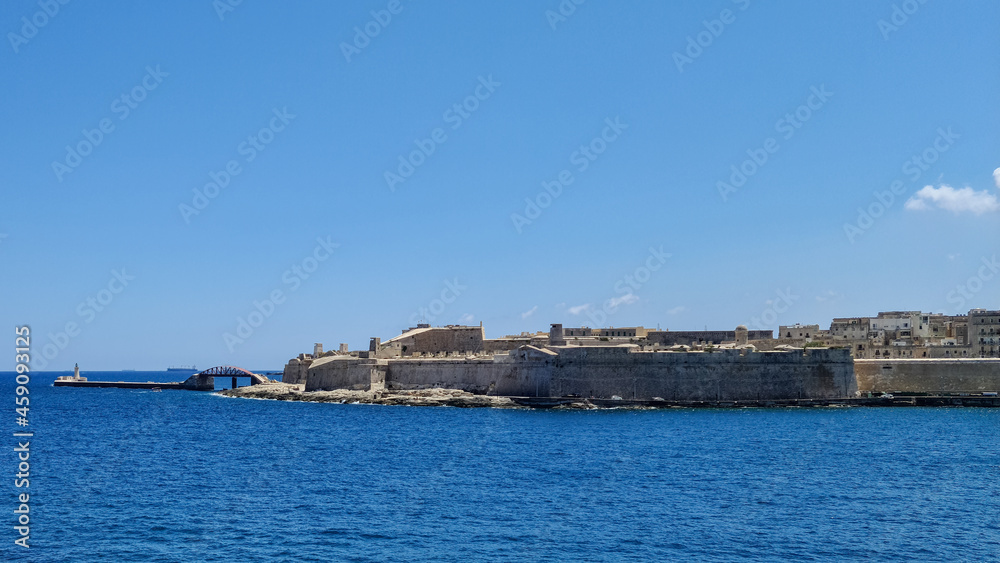 At the tip of Valletta, Malta is Fort Saint Elmo, the Valletta Breakwater lighthouse and the Saint. Elmo Bridge.
