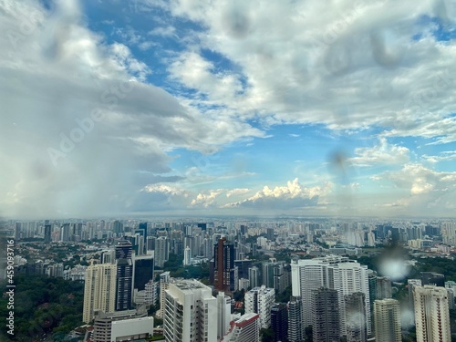 clouds with beautiful blue sky over city