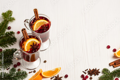 Mulled wine in glasses on a white background with copy space