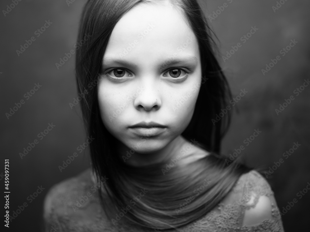 Fototapeta premium girl with sad expression close-up cropped view