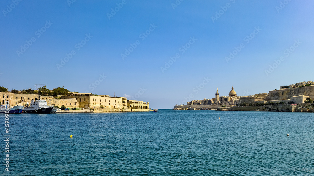 Marsamxett Harbour in-between the Lazzaretto quarantine facility on Manoel Island and the fortified City of Valletta.
