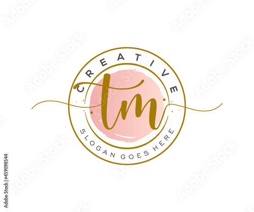 initial TM Feminine logo beauty monogram and elegant logo design, handwriting logo of initial signature, wedding, fashion, floral and botanical with creative template.