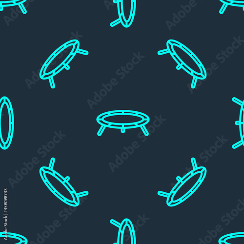 Green line Jumping trampoline icon isolated seamless pattern on blue background. Vector