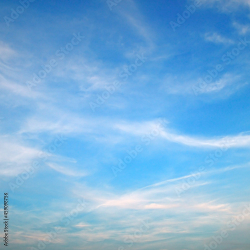 Blue sky and beautiful clouds on horizon.