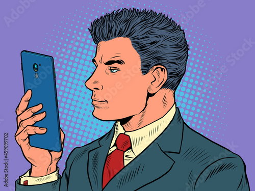 A man businessman looks at a smartphone Pop Art