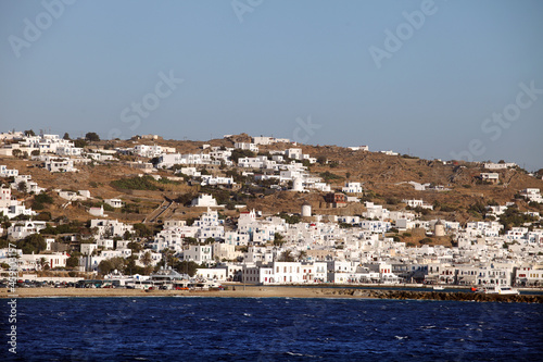 Fototapeta Naklejka Na Ścianę i Meble -  Beautiful Greek island Mykonos seaside and traditional bulidings in Greece. Mykonos is located to the area of the central Aegean Sea and belongs to the prefecture of Cyclades.