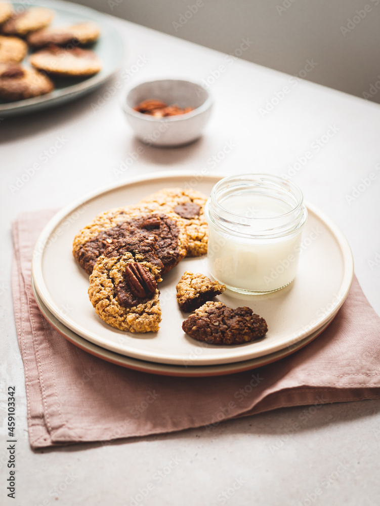 Milk and cookies on plate