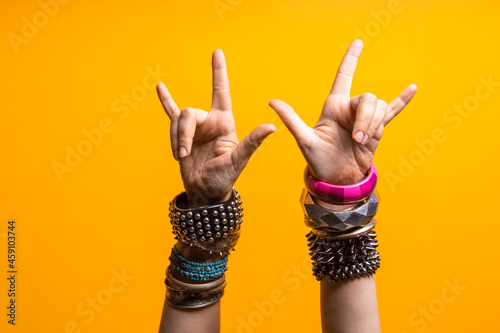 Hand gestures. Thumbs up, that's a cool gesture of the rocker.