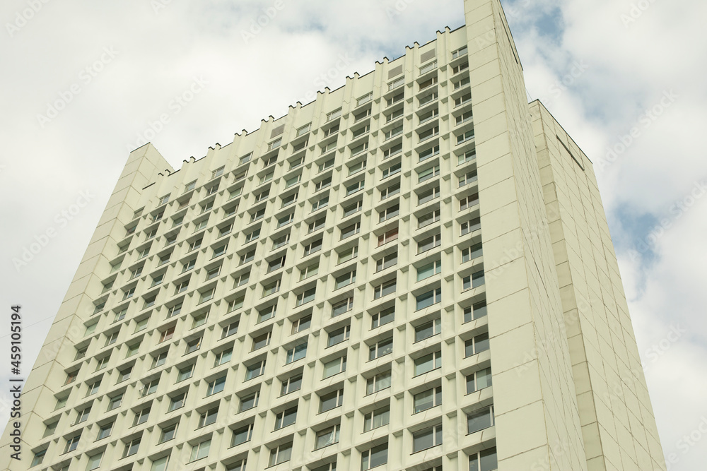 High building. There are many windows in the house. High building. There are many windows in the house.