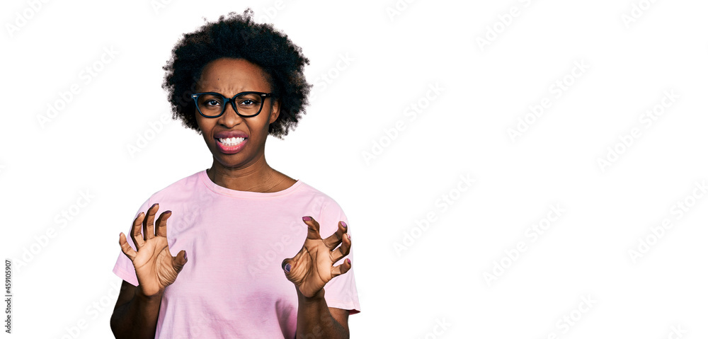 Ταπετσαρία African american woman with afro hair wearing casual clothes and glasses disgusted expression, displeased and fearful doing disgust face because aversion reaction