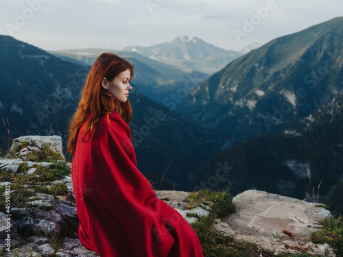 woman in a red plaid in the mountains outdoors fresh air cool