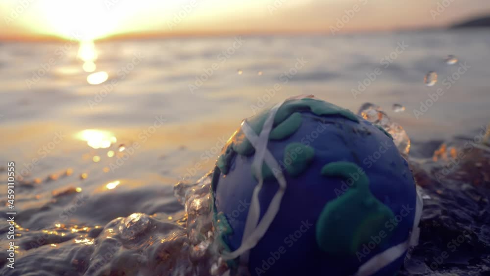 dirty earth model in water, earth pollution concept, wasted earth ...