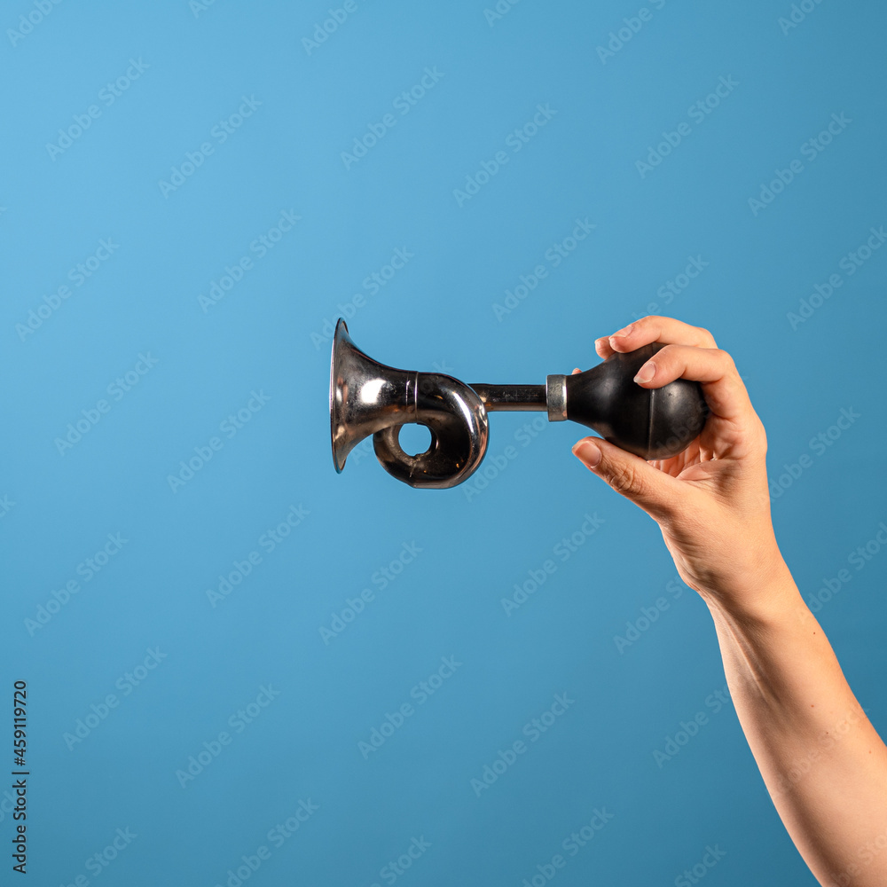 Attention, vintage bicycle horn, loud signal to attract attention.