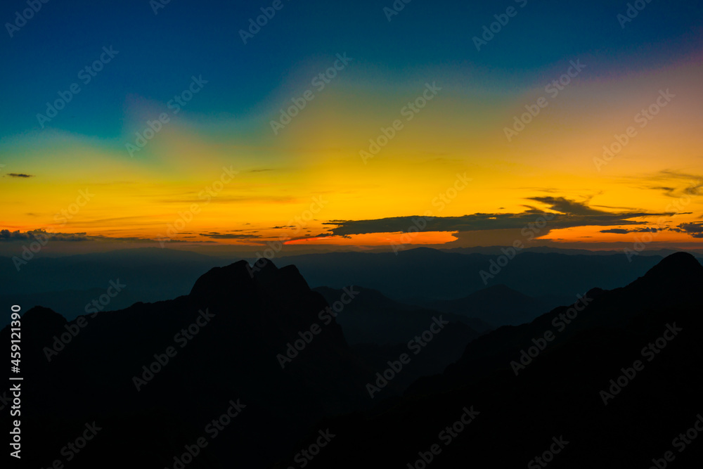Sunset sky with cloud on top of mountain Sunset sky with cloud on top of mountain