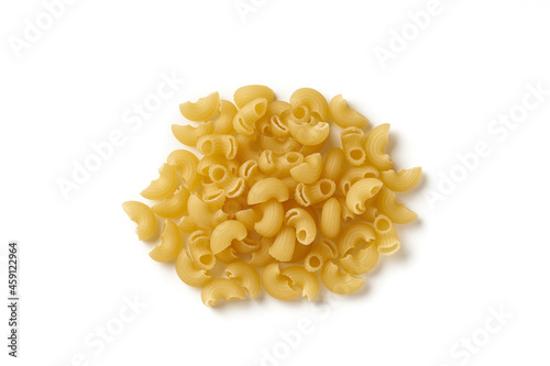 Top view of heap of raw elbow pasta isolated on white background