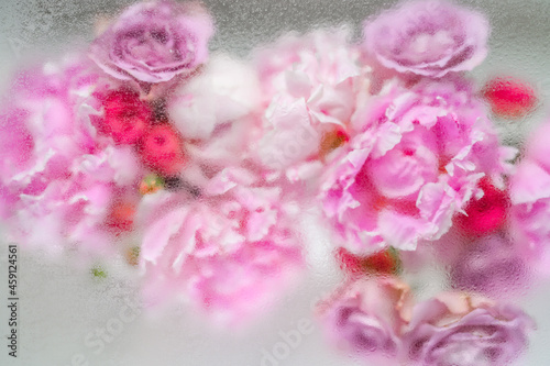 Fototapeta Naklejka Na Ścianę i Meble -  Abstract flower bouquet background under water drops