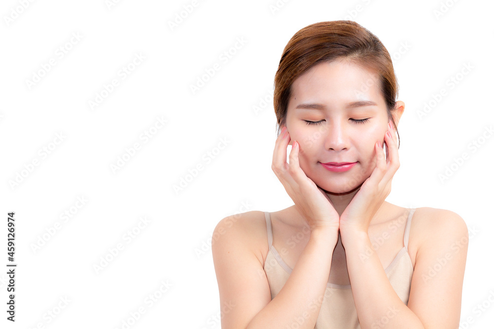 Beautiful Asian woman model close her eyes and holds cheeks by hand. Beautiful girl with brown hair. Presenting your make up product. Isolated on white background. Expressive facial expressions. Beautiful Asian woman model close her eyes and holds cheeks by hand. Beautiful girl with brown hair. Presenting your make up product. Isolated on white background. Expressive facial expressions.