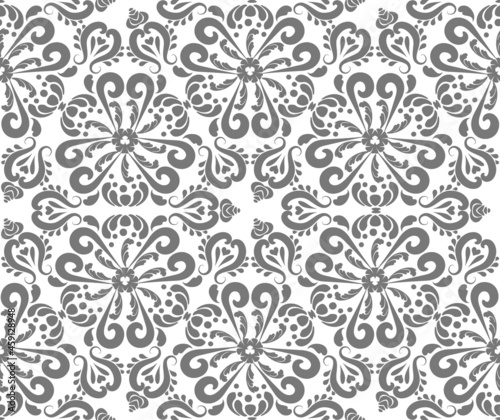 Gray oriental ornament seamless pattern. Rich damask pattern background. Gray, white color. Decorative texture. Mehndi patterns.  For fabric, wallpaper, packaging.