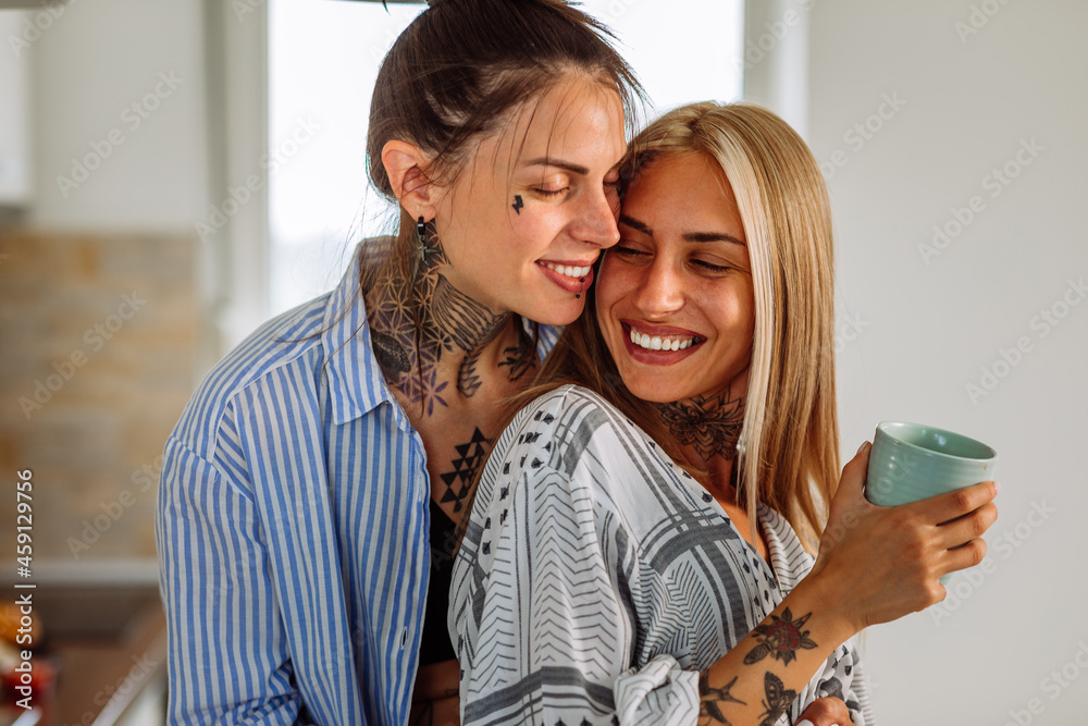 Lesbian couple spending quality time together at home Lesbian couple spending quality time together at home