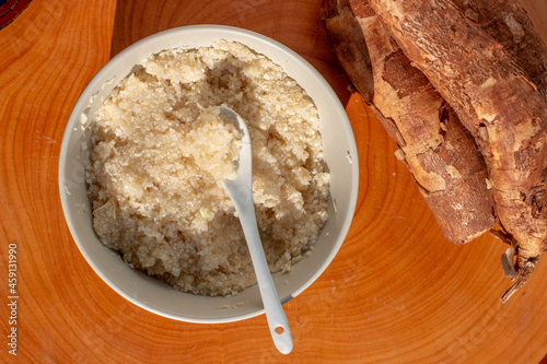 Coarse cassava flour porridge usually served with milk and sugar as a energetic breakfast in Africa