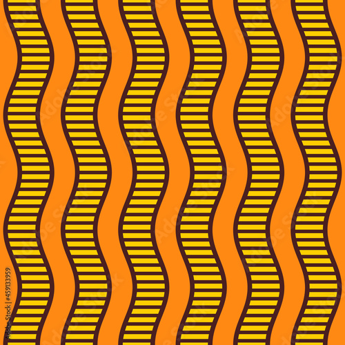 Seamless african fashion striped vector pattern. Wavy striped lines, stripes. Bright, vibrant colors. Orange, yellow, brown colors. Color illustration.