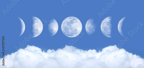 Phases of the Moon with the nice seascape : Waxing Crescent, Waxing Gibbous, Waning Gibbous, and Waning Crescent. Background blue sky with cumulus clouds. The pictures taken from own camera.